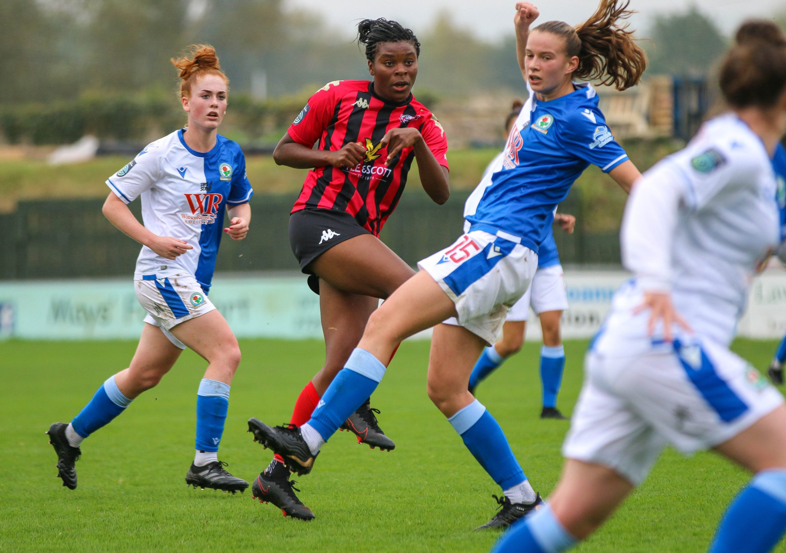 Blackburn Women playing against Lewes Women. Annabelle Blanchard is featured.